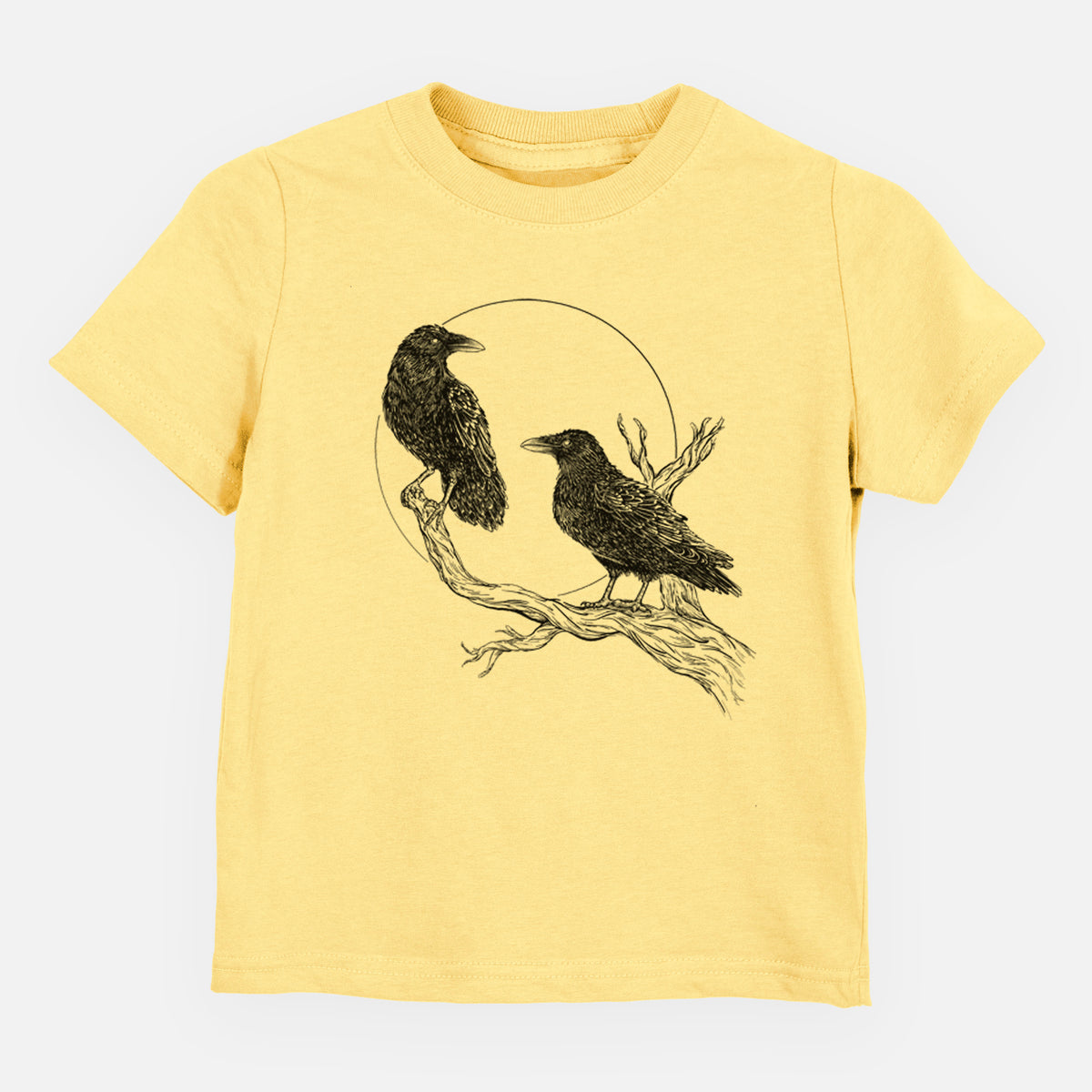 Butter yellow toddler t-shirt laid flat, printed with a black ink illustration of two ravens perched on a branch in front of a full moon.