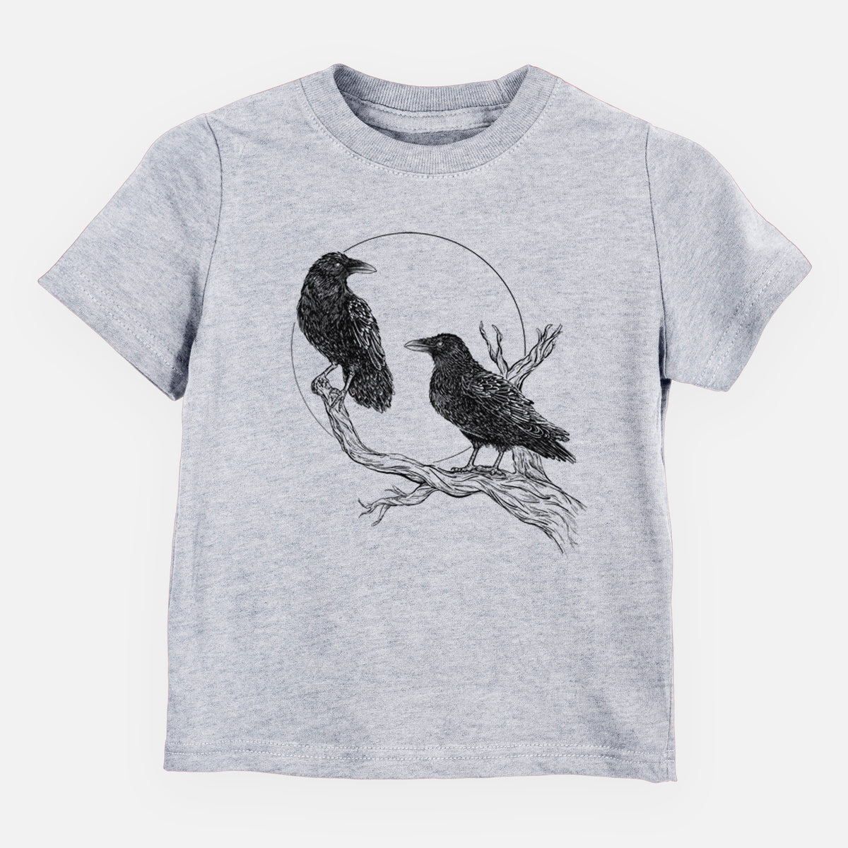 Heather grey toddler t-shirt laid flat, printed with a black ink illustration of two ravens perched on a branch in front of a full moon.