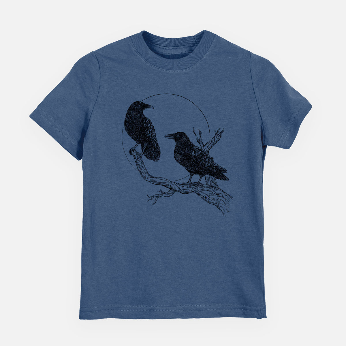 Indigo blue youth t-shirt laid flat, printed with a black ink illustration of two ravens perched on a branch in front of a full moon.