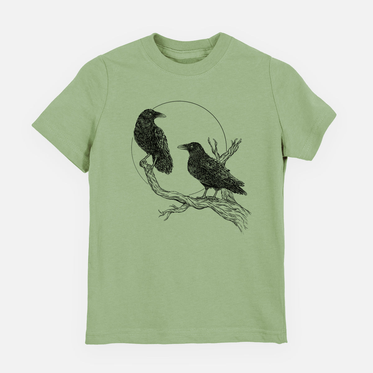 Sage green youth t-shirt laid flat, printed with a black ink illustration of two ravens perched on a branch in front of a full moon.