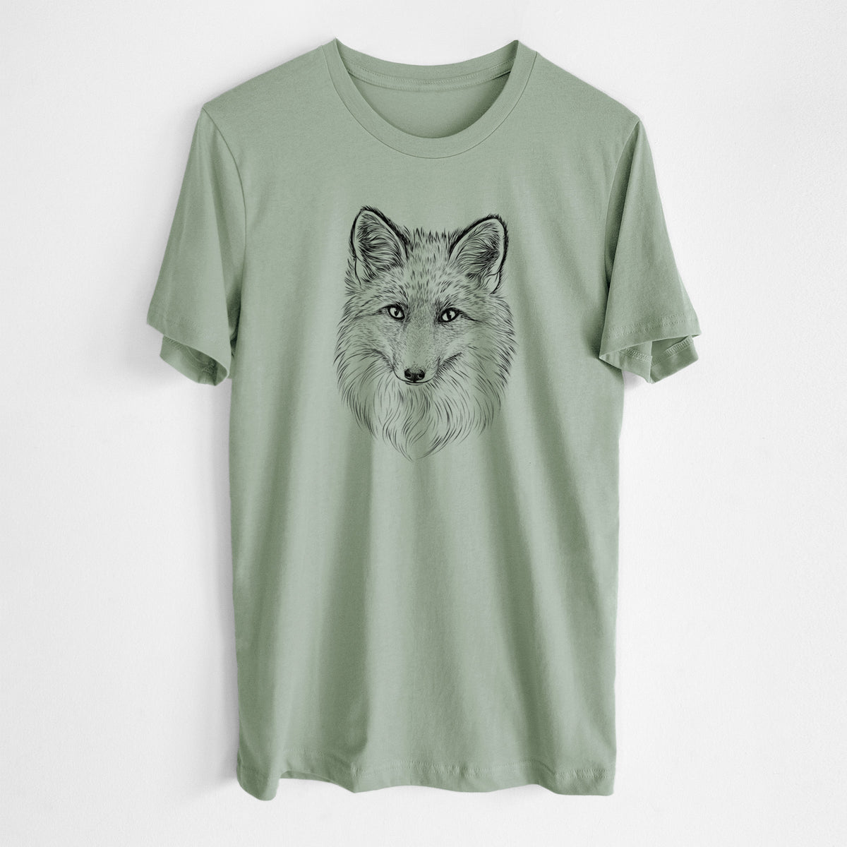 Sage green lightweight cotton t-shirt laid flat, printed with a detailed black ink sketch of a red fox's face looking straight ahead, its fur drawn in fine pencil-like strokes.