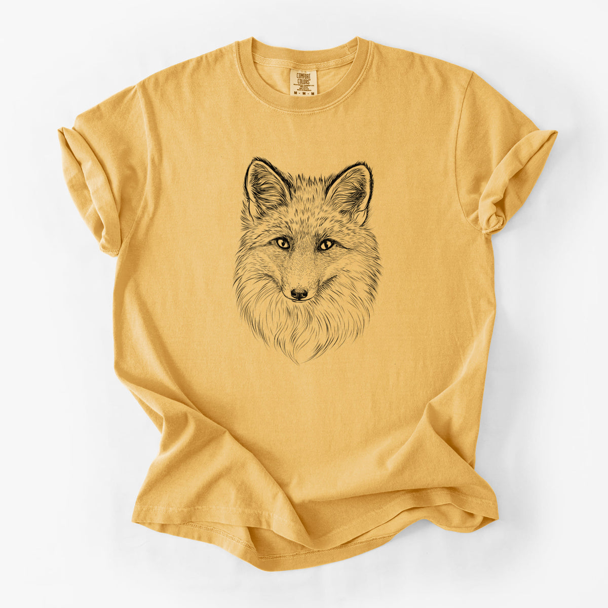 Golden wheat yellow Comfort Colors t-shirt laid flat, printed with a detailed black ink sketch of a red fox's face looking straight ahead, its fur drawn in fine pencil-like strokes.