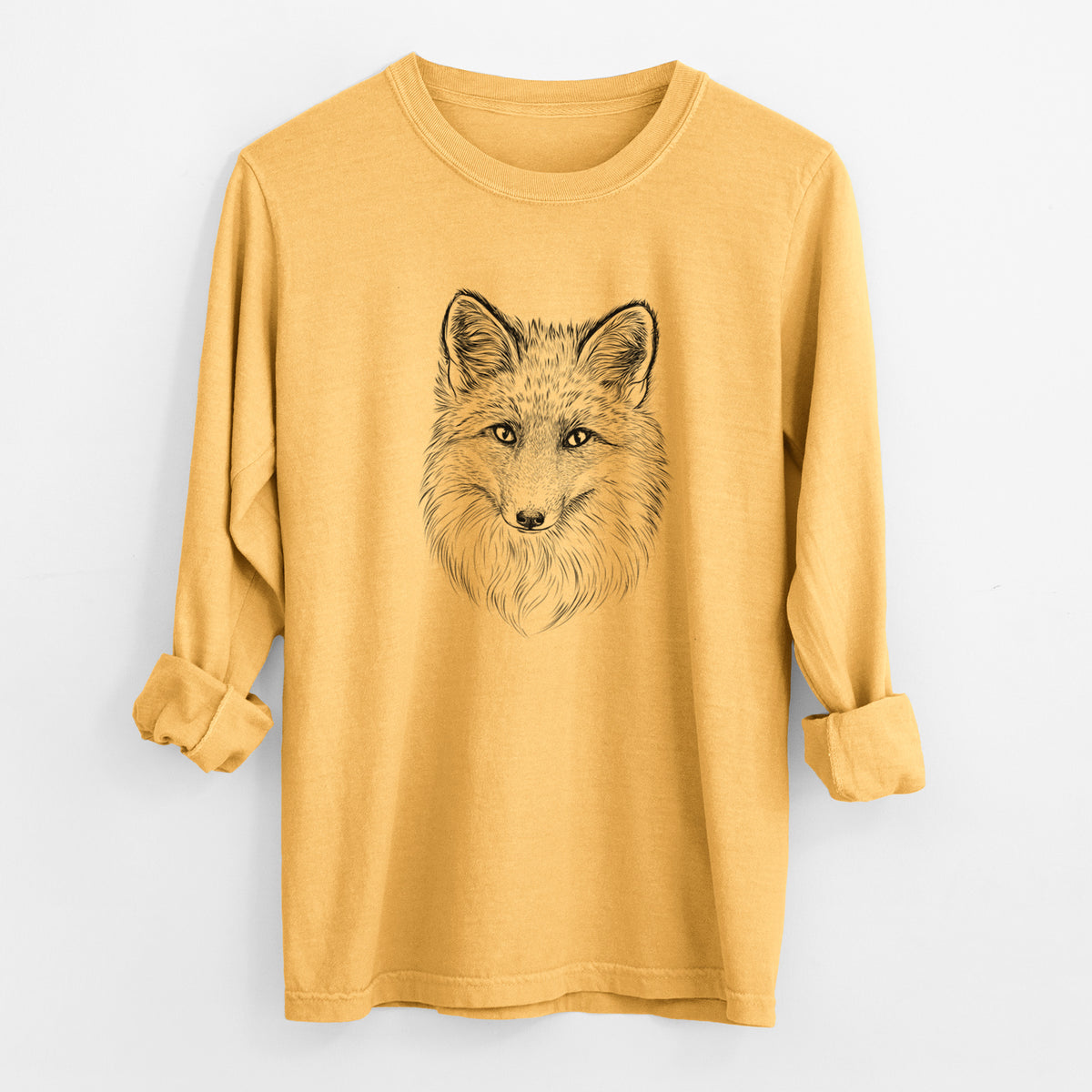 Golden wheat yellow Comfort Colors long sleeve shirt laid flat with the cuffs rolled, printed with a detailed black ink sketch of a red fox's face looking straight ahead, its fur drawn in fine pencil-like strokes.