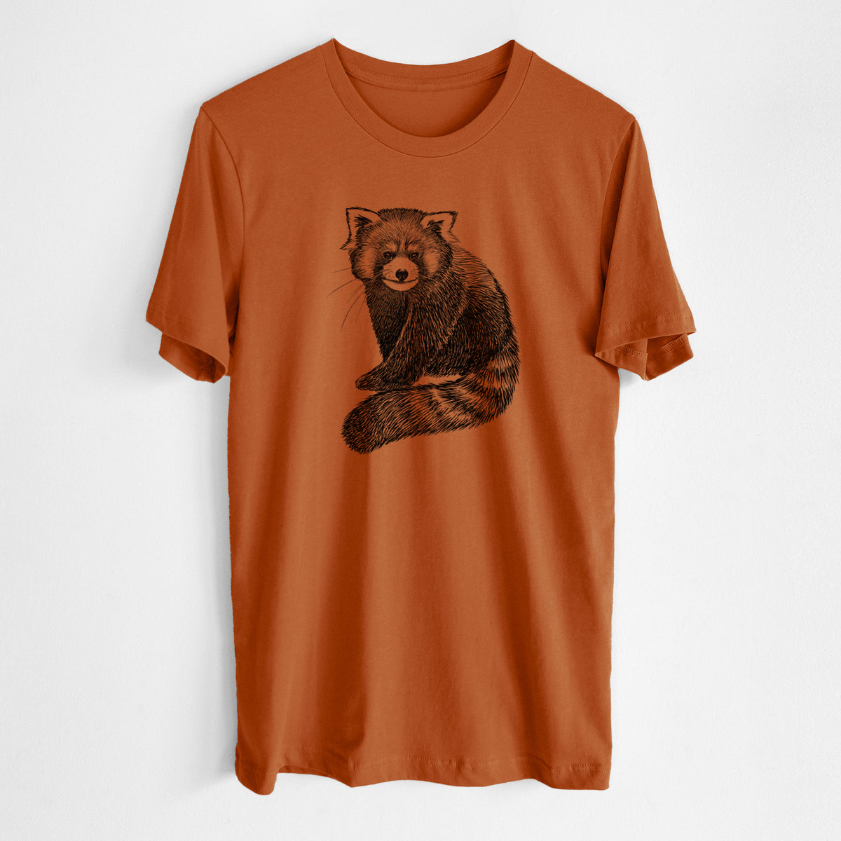 Autumn lightweight cotton t-shirt laid flat, printed with a detailed black ink illustration of a red panda sitting with its striped tail wrapped around.
