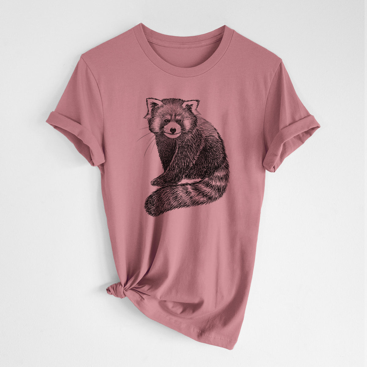 Mauve pink lightweight cotton t-shirt laid flat with the sleeves rolled, printed with a detailed black ink illustration of a red panda sitting with its striped tail wrapped around.