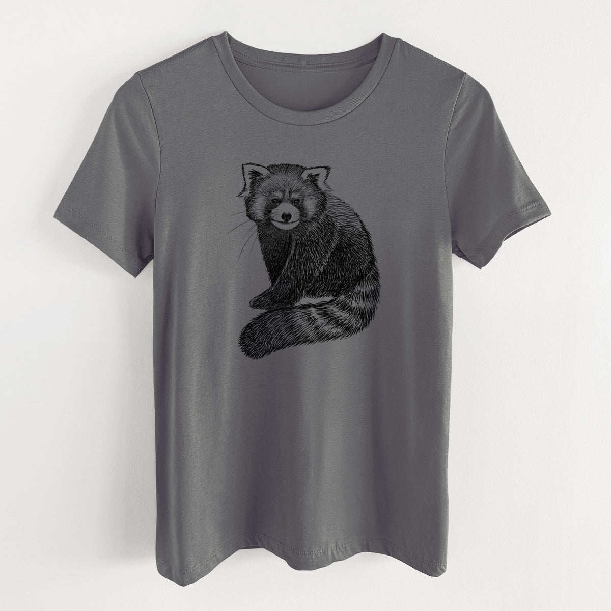 Asphalt women's relaxed fit cotton t-shirt laid flat, printed with a detailed black ink illustration of a red panda sitting with its striped tail wrapped around.
