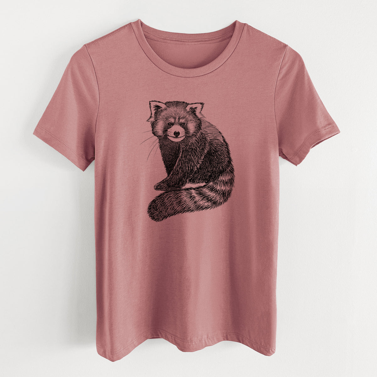 Mauve pink women's relaxed fit cotton t-shirt laid flat, printed with a detailed black ink illustration of a red panda sitting with its striped tail wrapped around.