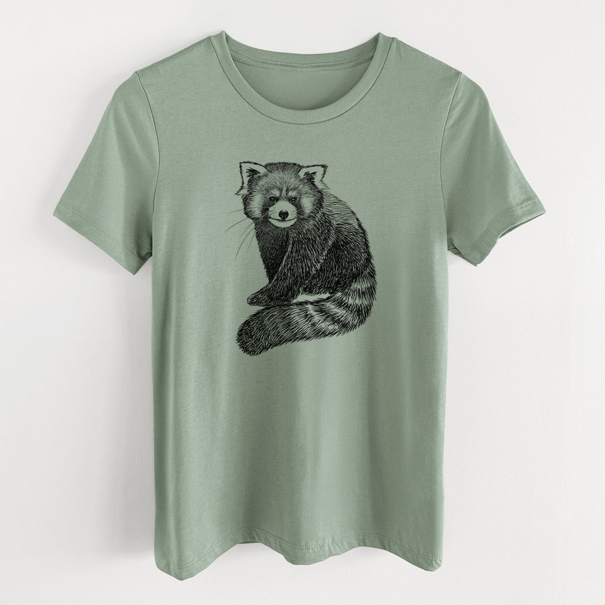 Sage green women's relaxed fit cotton t-shirt laid flat, printed with a detailed black ink illustration of a red panda sitting with its striped tail wrapped around.