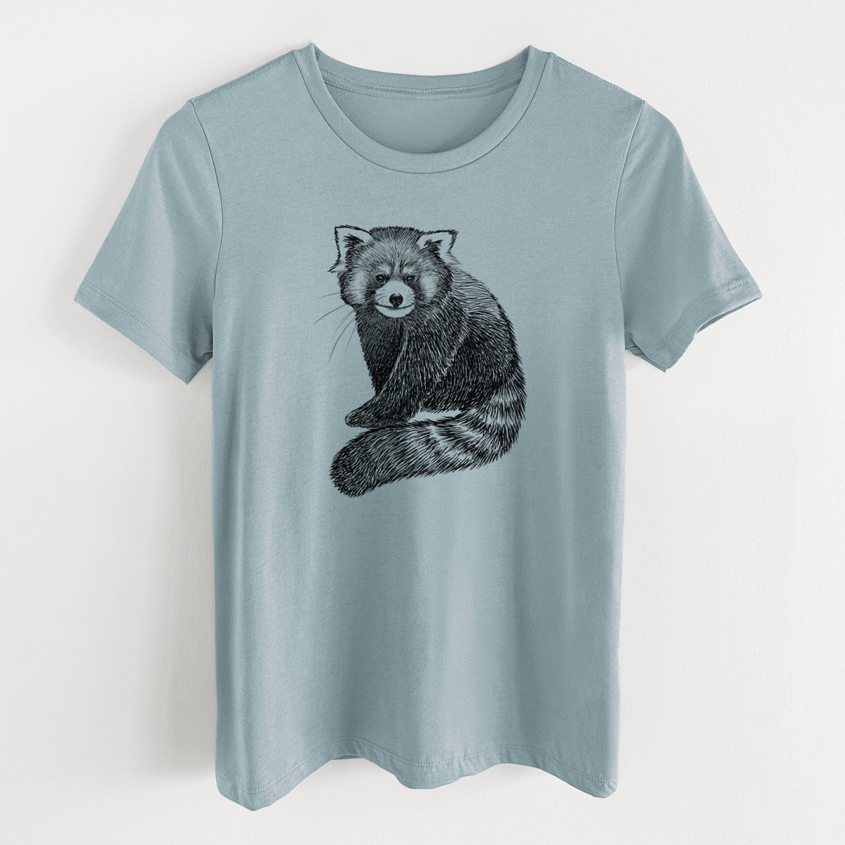 Vintage denim women's relaxed fit cotton t-shirt laid flat, printed with a detailed black ink illustration of a red panda sitting with its striped tail wrapped around.