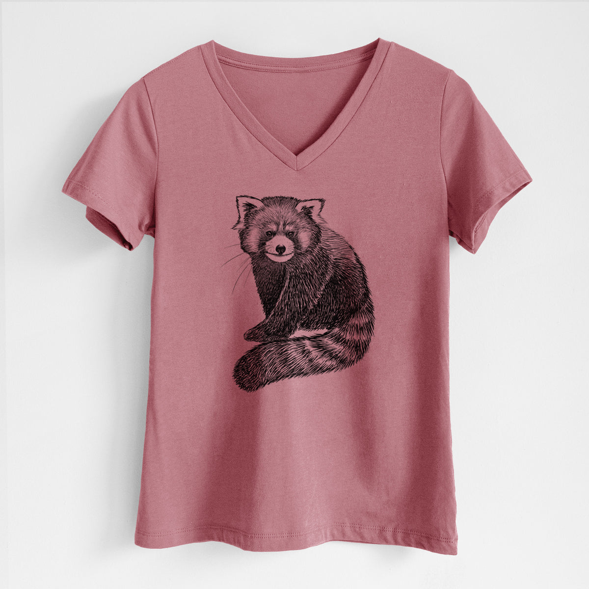 Mauve pink women's relaxed fit cotton V-neck t-shirt laid flat, printed with a detailed black ink illustration of a red panda sitting with its striped tail wrapped around.