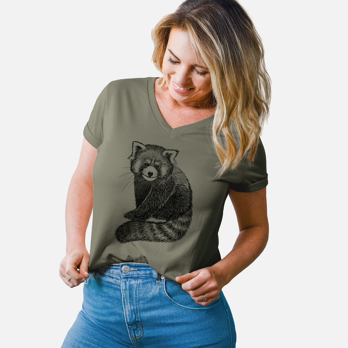 Woman wearing a military green women's relaxed fit cotton V-neck t-shirt printed with a detailed black ink illustration of a red panda sitting with its striped tail wrapped around.