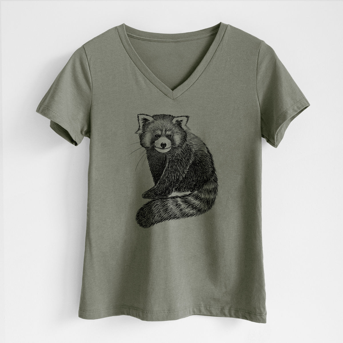 Military green women's relaxed fit cotton V-neck t-shirt laid flat, printed with a detailed black ink illustration of a red panda sitting with its striped tail wrapped around.