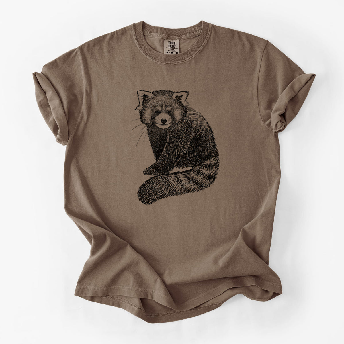 Espresso brown Comfort Colors t-shirt laid flat, printed with a detailed black ink illustration of a red panda sitting with its striped tail wrapped around.