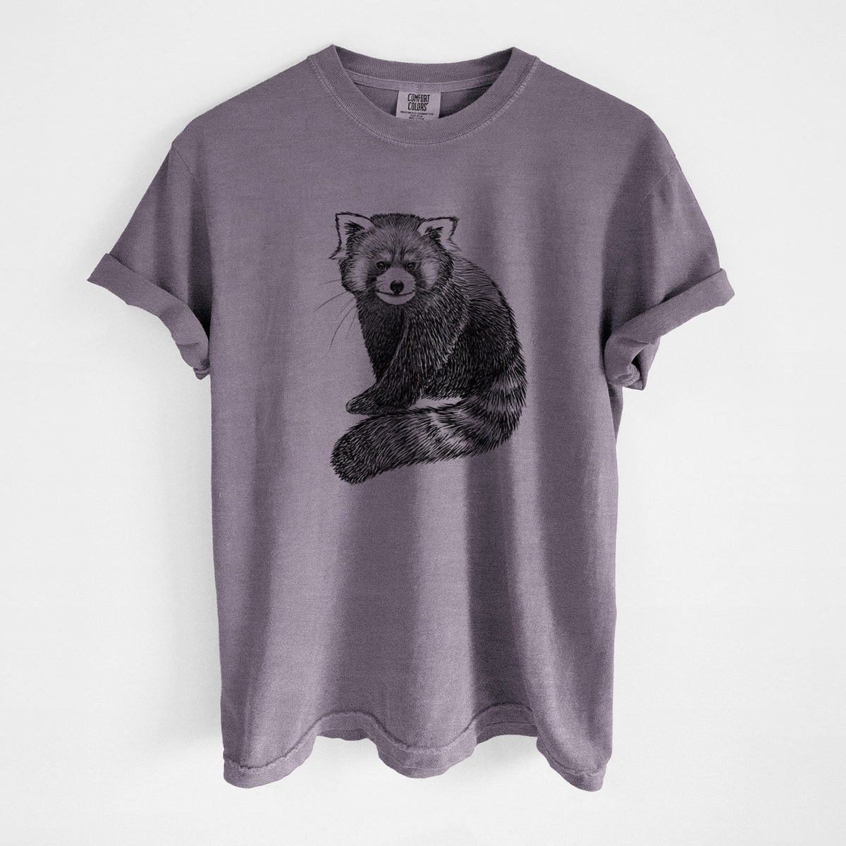 Wine red Comfort Colors t-shirt laid flat, printed with a detailed black ink illustration of a red panda sitting with its striped tail wrapped around.