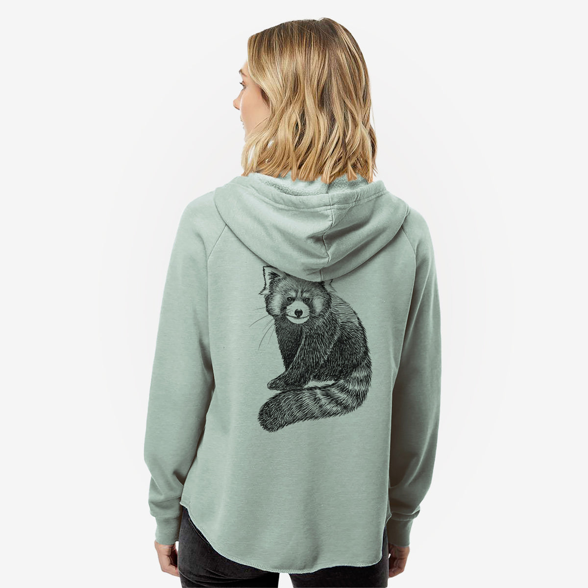 Woman wearing a sage green women's Cali Wave zip-up sweatshirt printed with a detailed black ink illustration of a red panda sitting with its striped tail wrapped around, seen from behind.