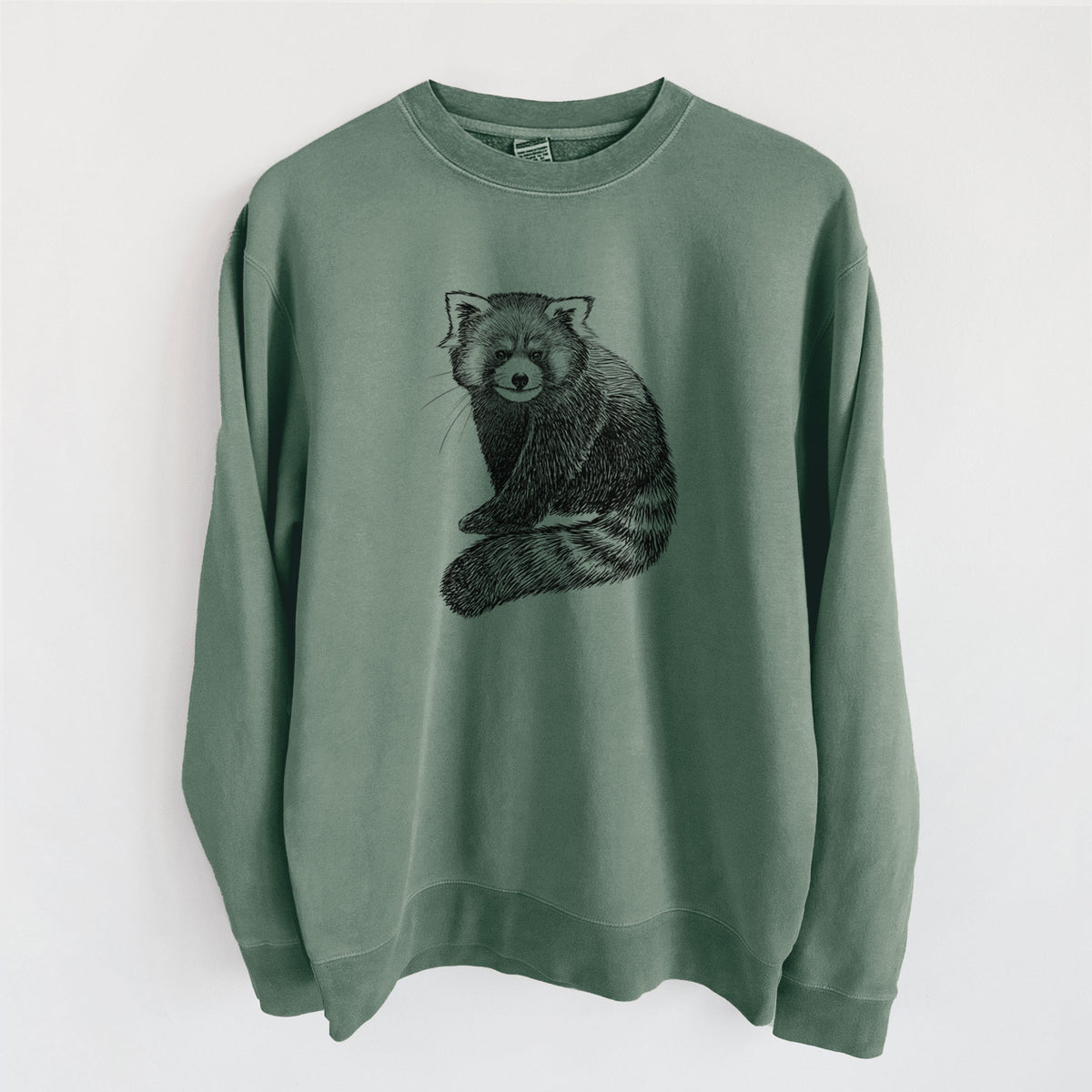 Alpine green pigment dyed crewneck sweatshirt laid flat, printed with a detailed black ink illustration of a red panda sitting with its striped tail wrapped around.