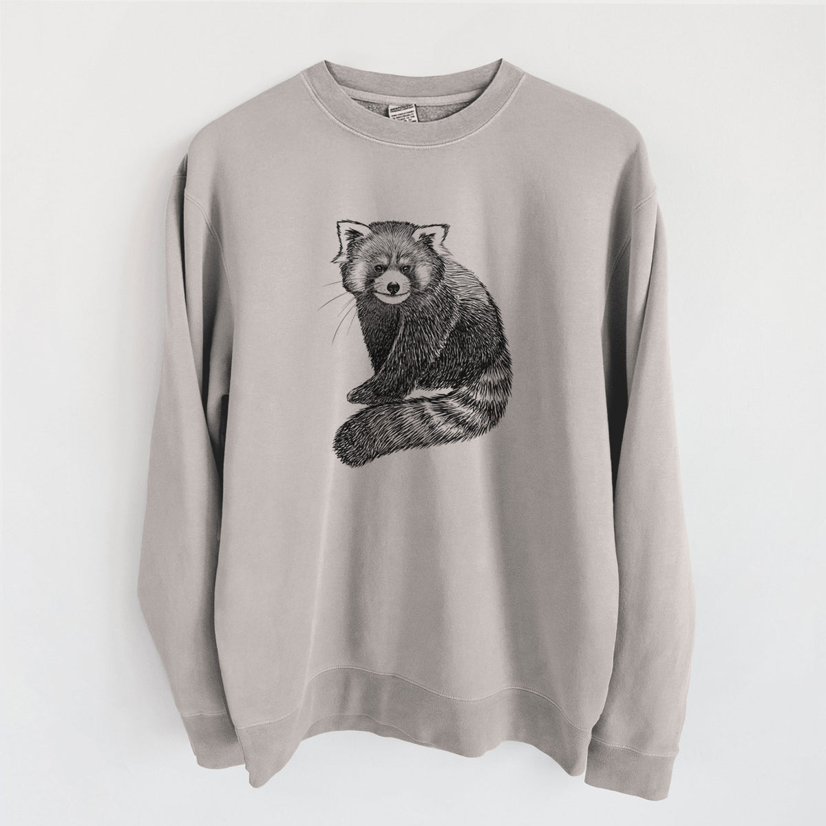 Cement grey pigment dyed crewneck sweatshirt laid flat, printed with a detailed black ink illustration of a red panda sitting with its striped tail wrapped around.