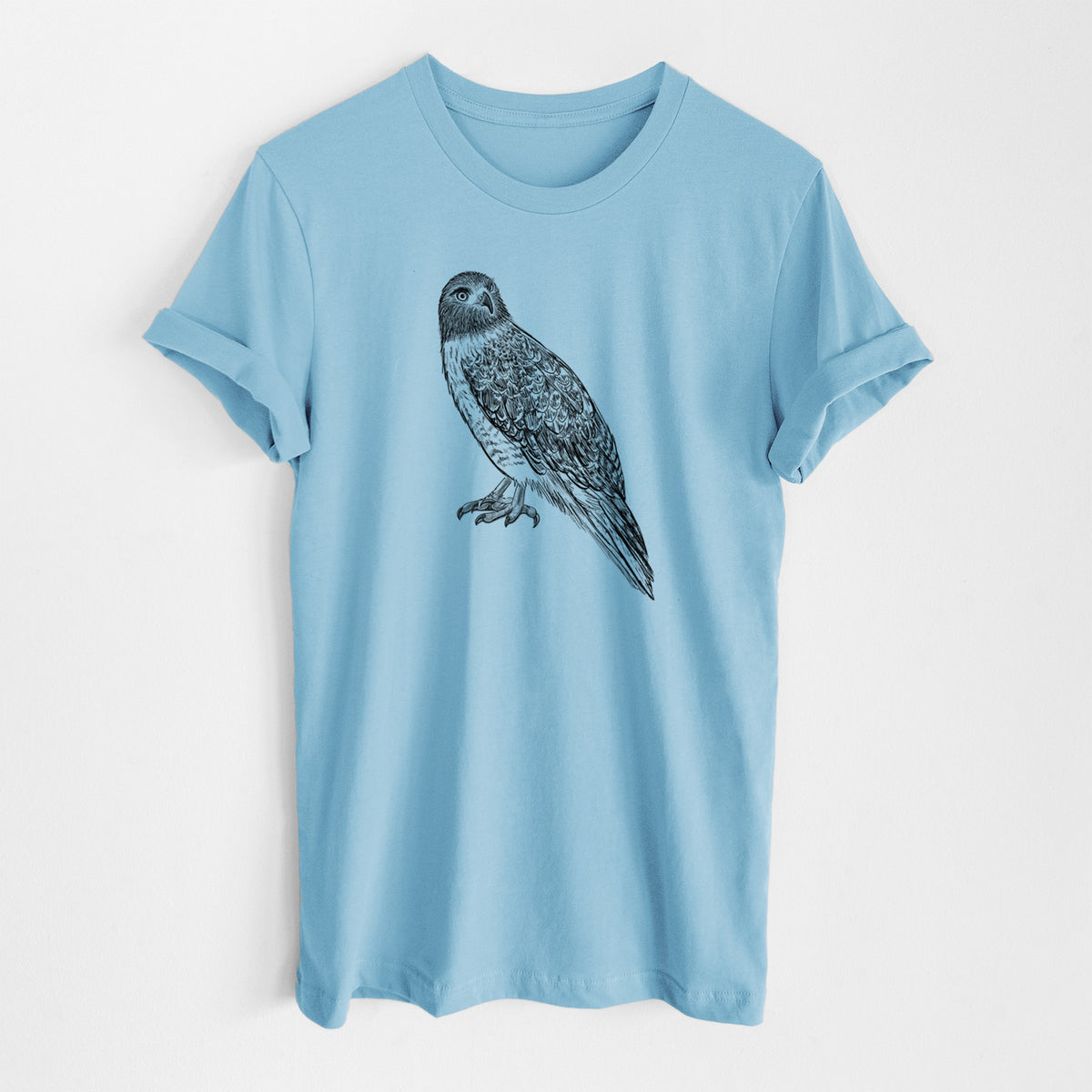 Ocean blue lightweight cotton t-shirt laid flat, printed with a detailed black ink illustration of a red-tailed hawk perched.