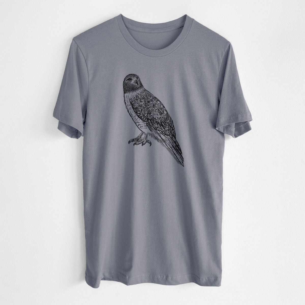 Storm grey lightweight cotton t-shirt laid flat, printed with a detailed black ink illustration of a red-tailed hawk perched.