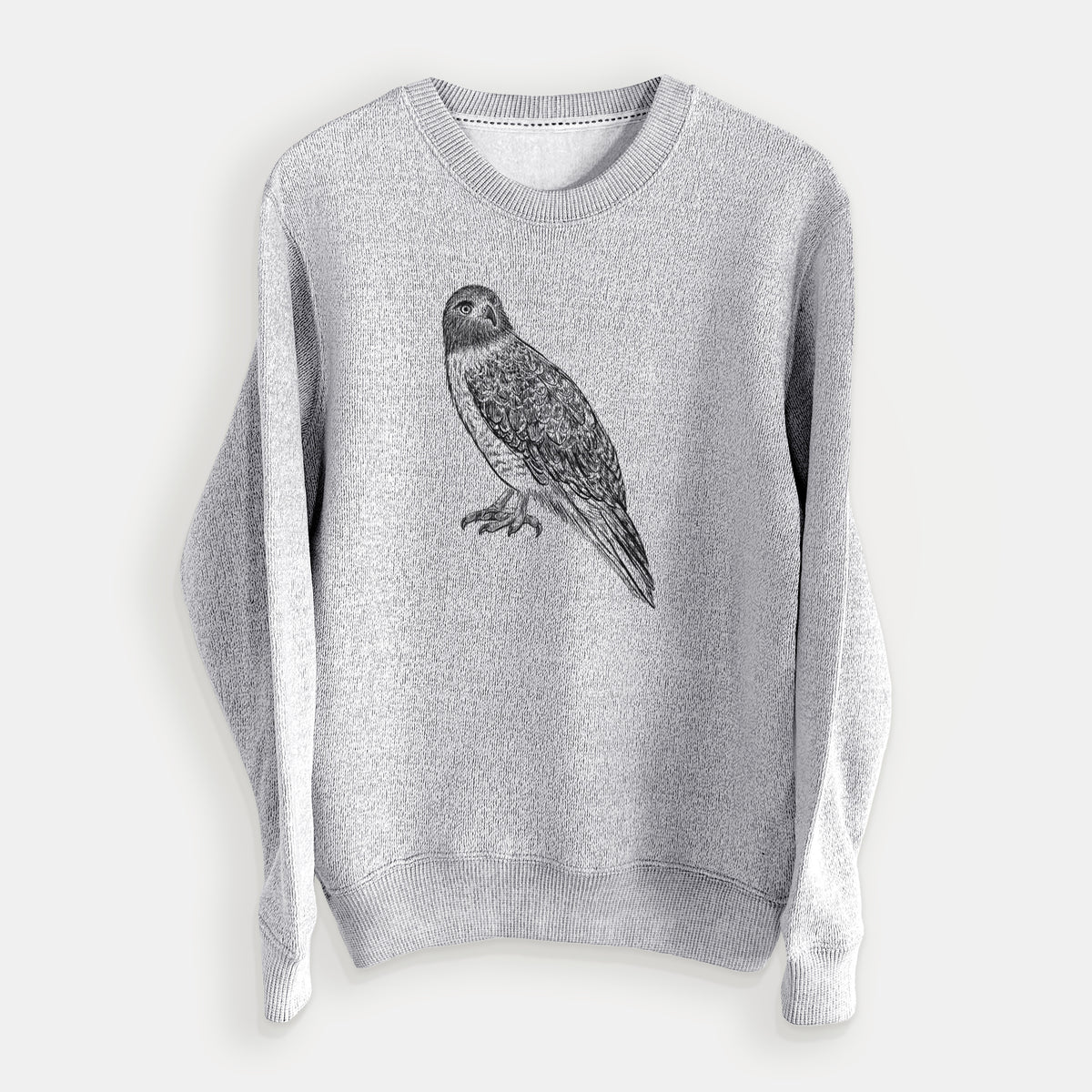 Salt and pepper knit sweatshirt laid flat, printed with a detailed black ink illustration of a red-tailed hawk perched.