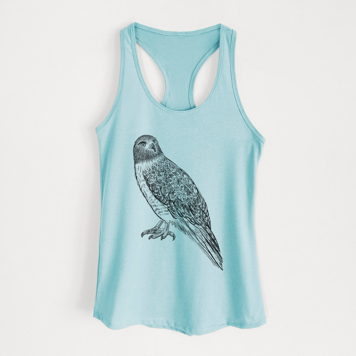 Cancun blue women's racerback tank top laid flat, printed with a detailed black ink illustration of a red-tailed hawk perched.