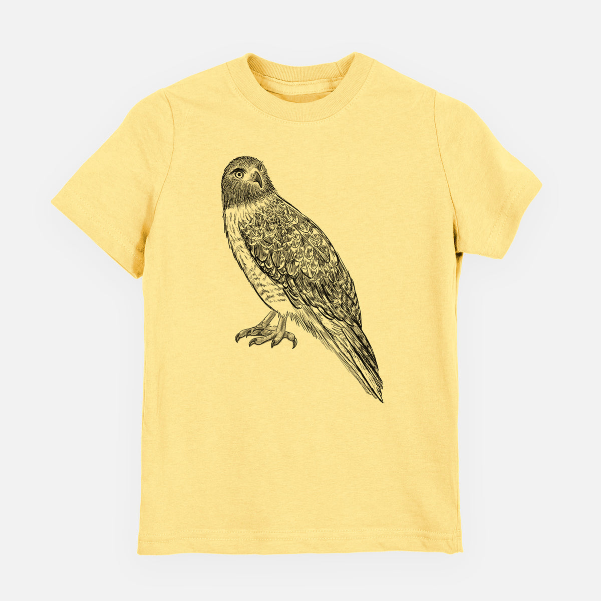 Butter yellow youth t-shirt laid flat, printed with a detailed black ink illustration of a red-tailed hawk perched.