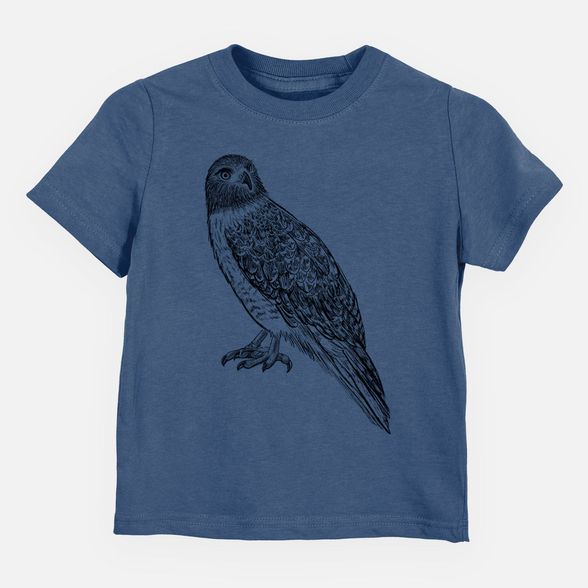 Indigo blue toddler t-shirt laid flat, printed with a detailed black ink illustration of a red-tailed hawk perched.