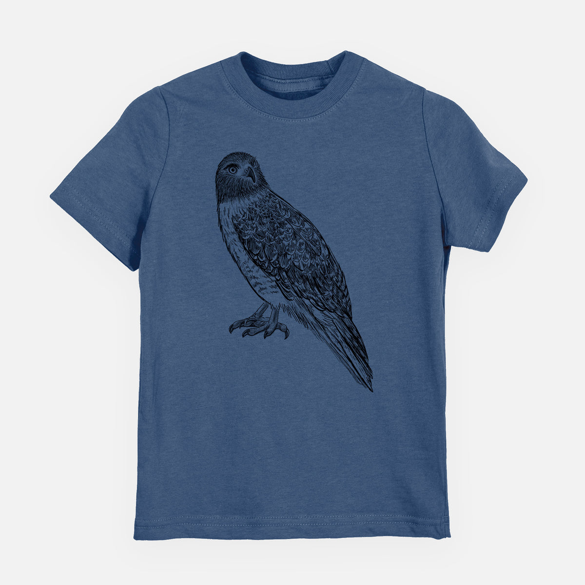 Indigo blue youth t-shirt laid flat, printed with a detailed black ink illustration of a red-tailed hawk perched.