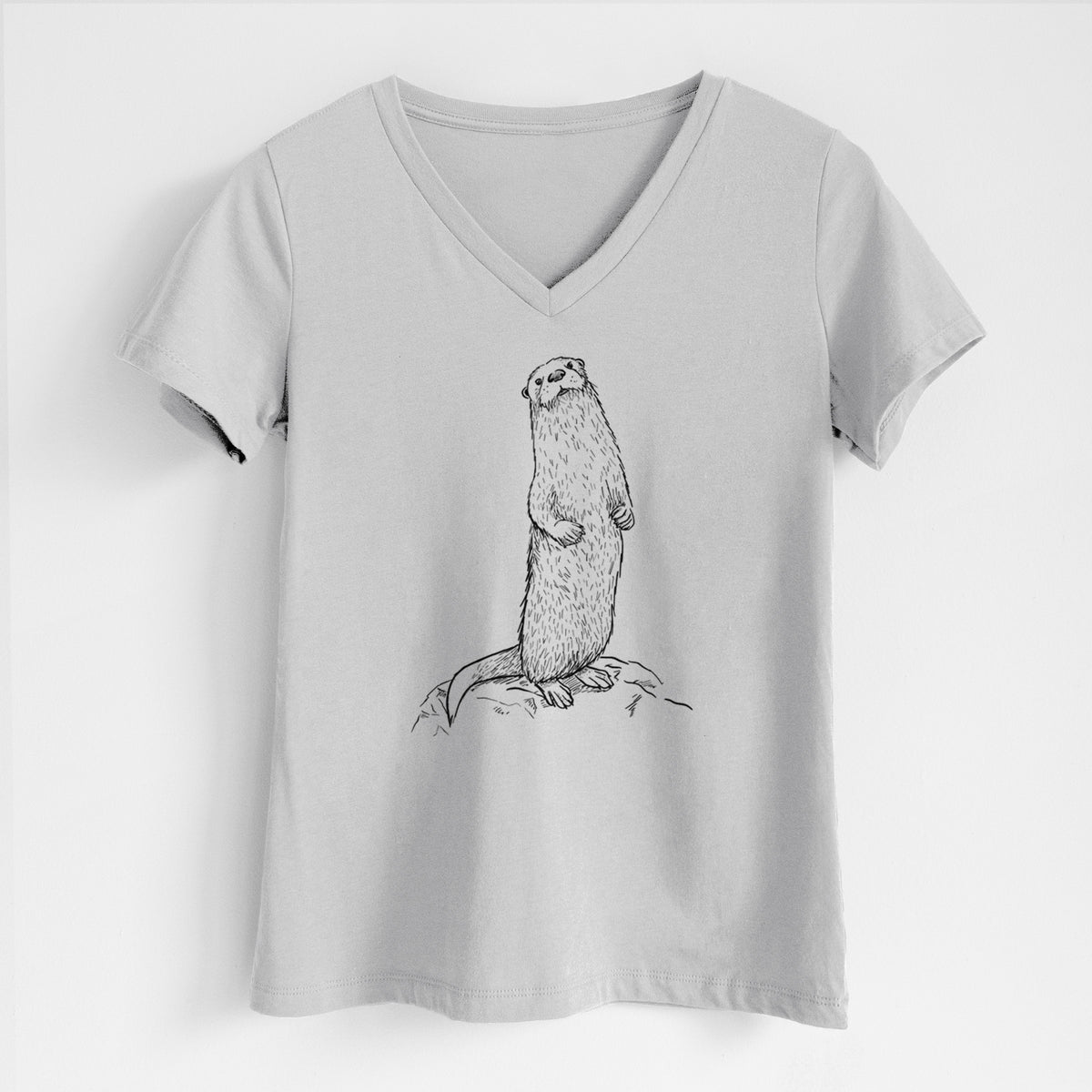 Lunar grey women's relaxed fit cotton V-neck t-shirt laid flat, printed with a black ink illustration of a river otter standing upright on a rock.