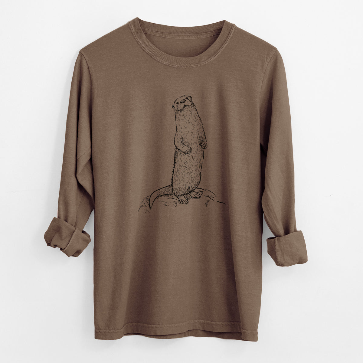 Espresso brown Comfort Colors long sleeve shirt laid flat with the cuffs rolled, printed with a black ink illustration of a river otter standing upright on a rock.