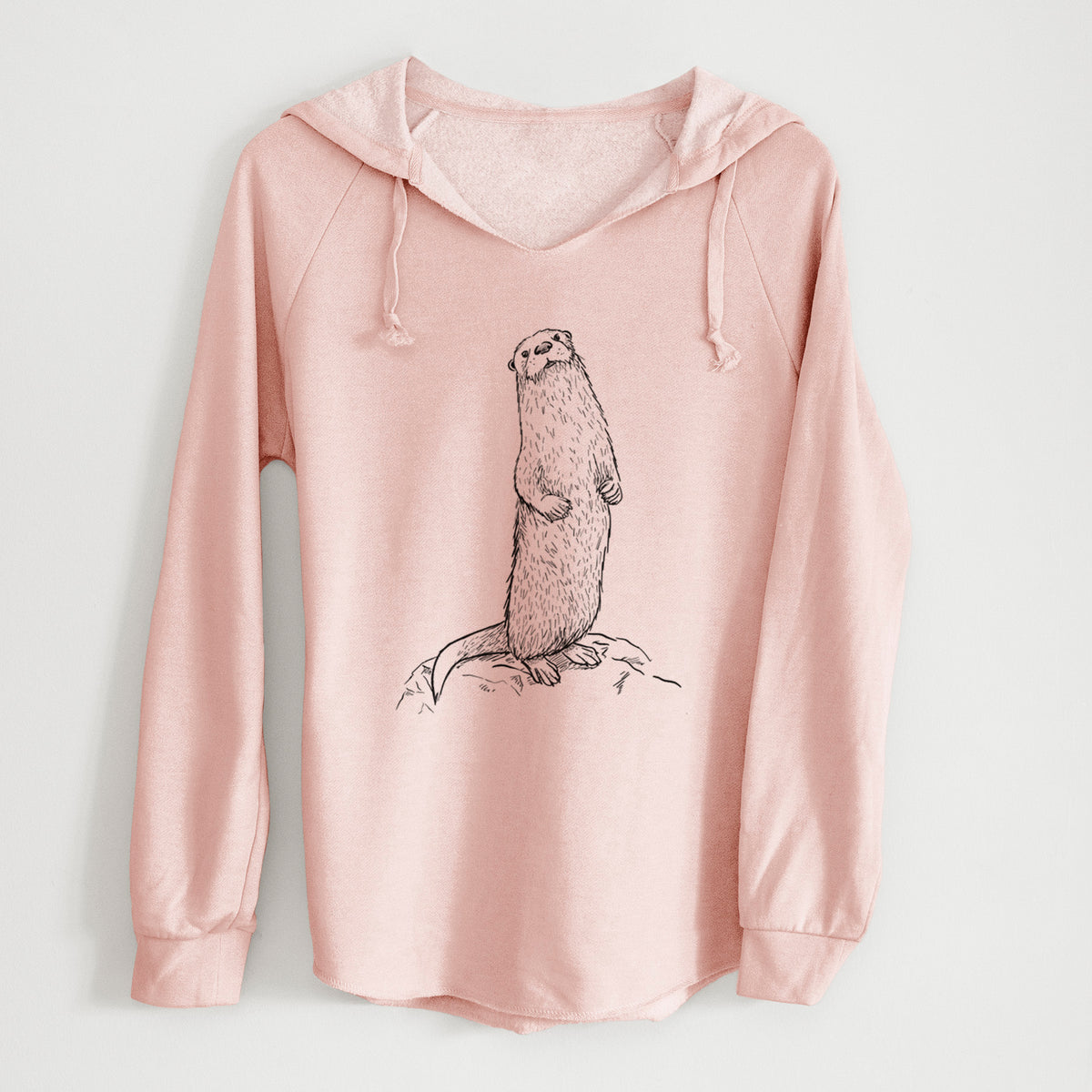 Blush pink women's Cali Wave hooded sweatshirt laid flat, printed with a black ink illustration of a river otter standing upright on a rock.