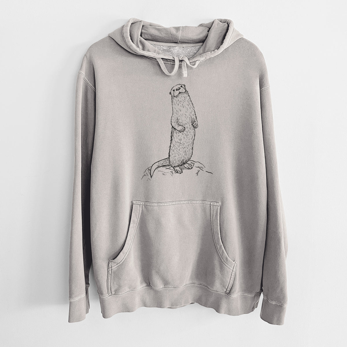 Cement grey pigment dyed hoodie laid flat, printed with a black ink illustration of a river otter standing upright on a rock.