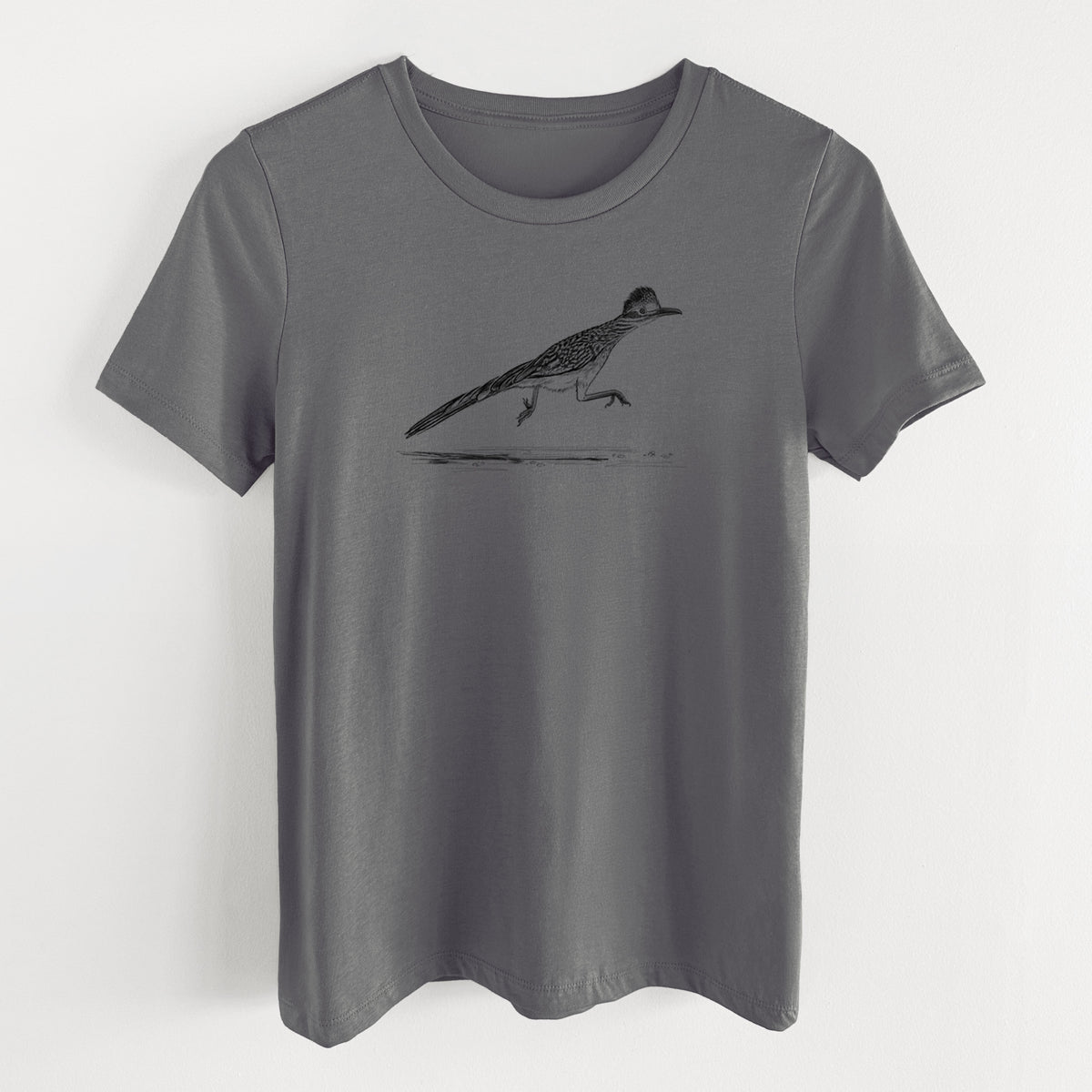 Asphalt women's relaxed fit cotton t-shirt laid flat, printed with a black ink illustration of a roadrunner running.