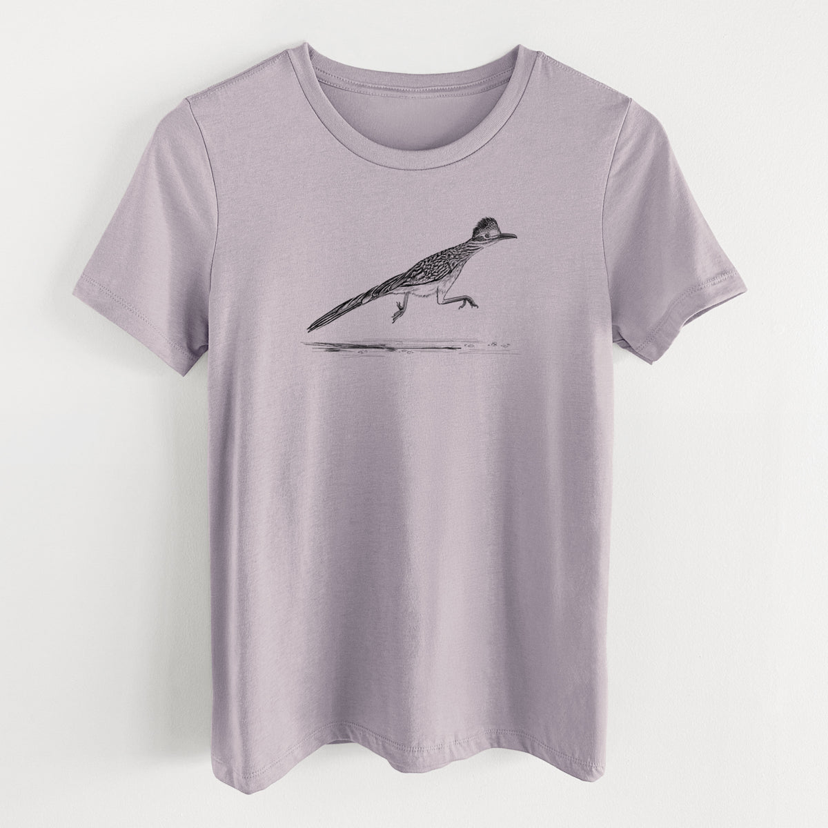 Light violet women's relaxed fit cotton t-shirt laid flat, printed with a black ink illustration of a roadrunner running.