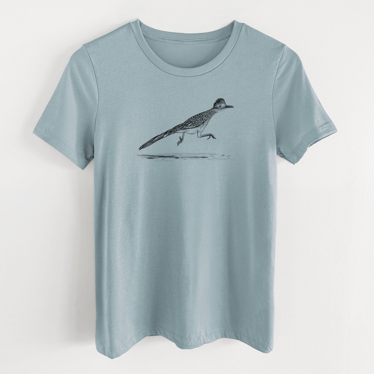 Vintage denim women's relaxed fit cotton t-shirt laid flat, printed with a black ink illustration of a roadrunner running.