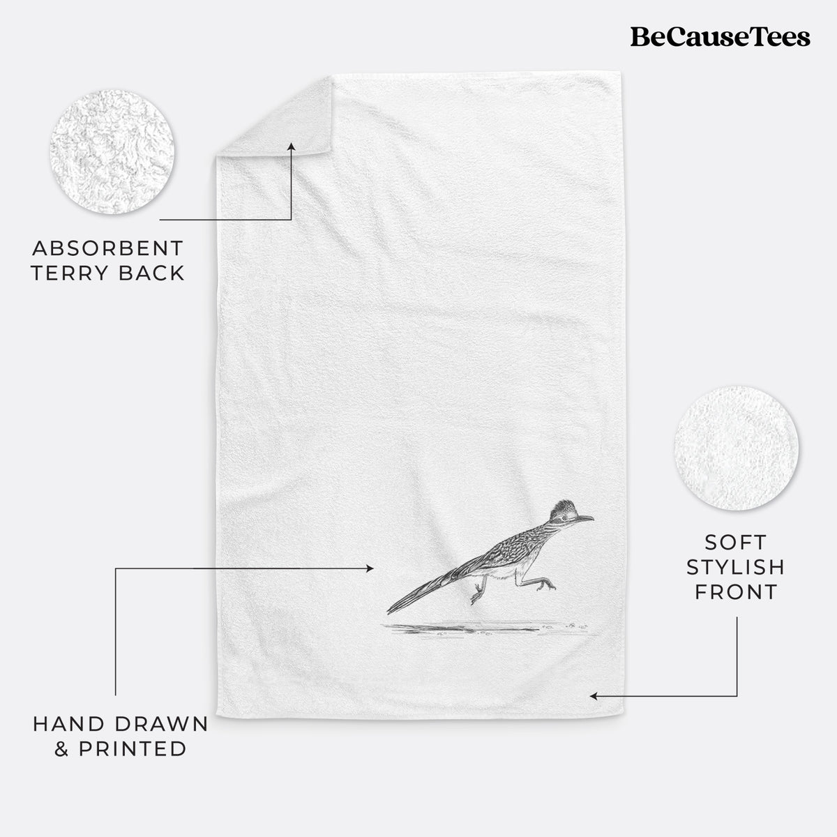 White hand towel printed with a black ink illustration of a roadrunner running.