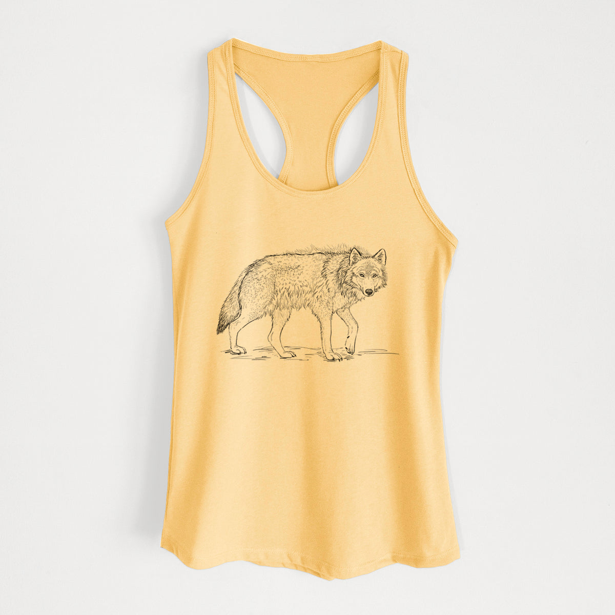 Banana cream women's racerback tank top laid flat, printed with a detailed black ink illustration of a grey wolf walking.