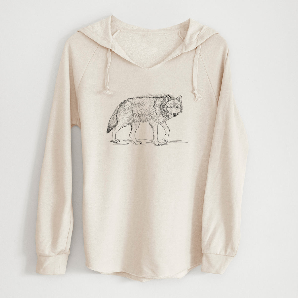 Bone cream women's Cali Wave hooded sweatshirt laid flat, printed with a detailed black ink illustration of a grey wolf walking.