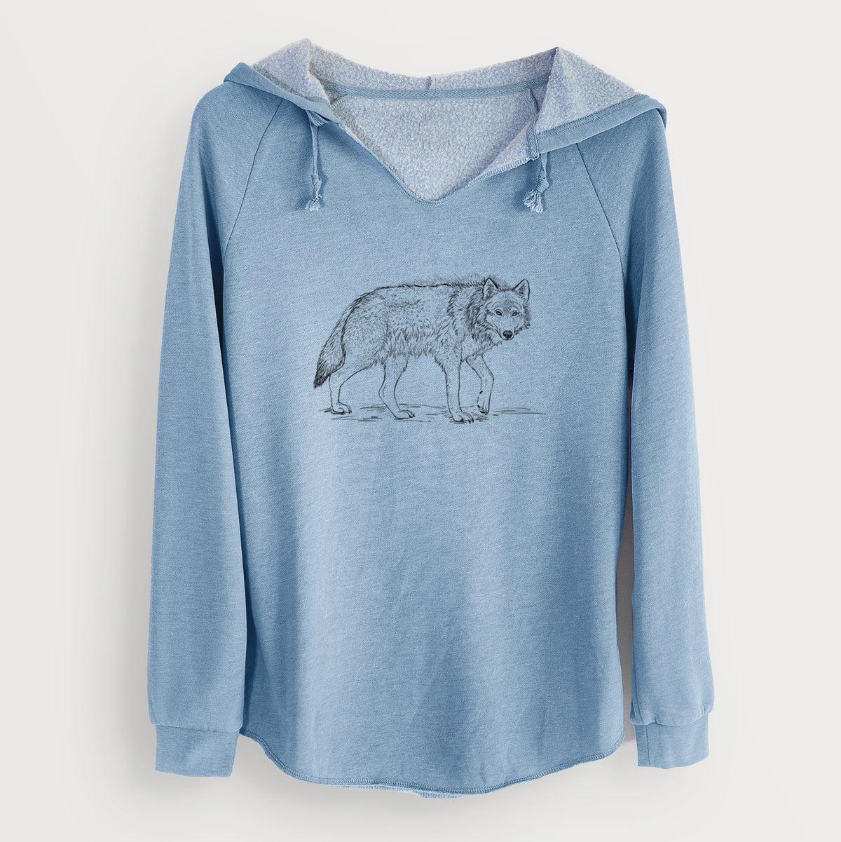 Misty blue women's Cali Wave hooded sweatshirt laid flat, printed with a detailed black ink illustration of a grey wolf walking.