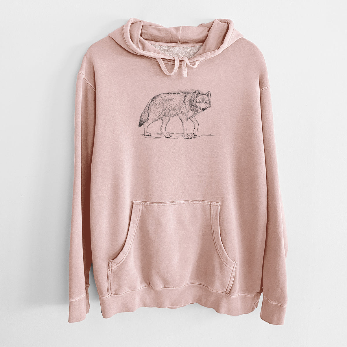 Dusty pink pigment dyed hoodie laid flat, printed with a detailed black ink illustration of a grey wolf walking.