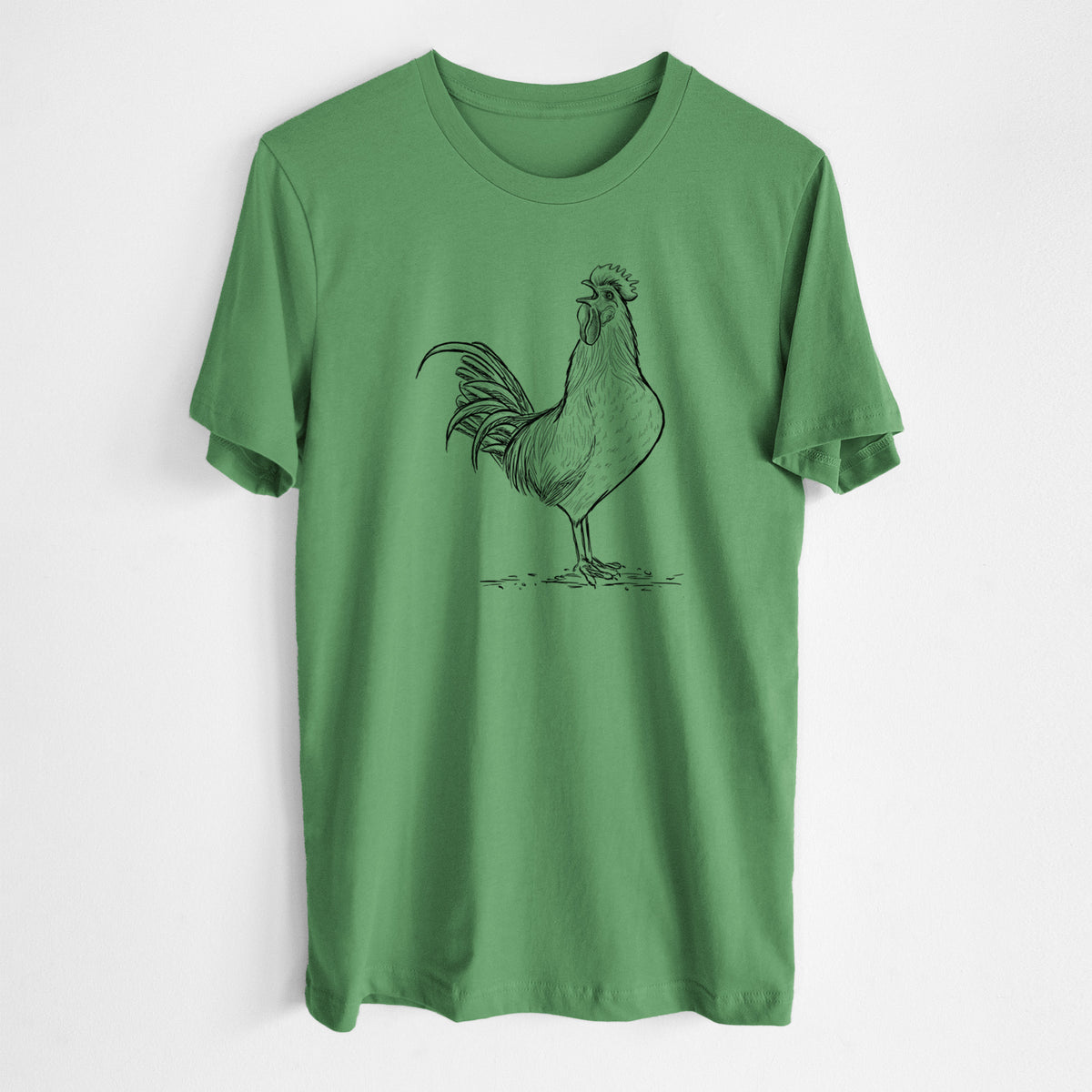 Leaf green lightweight cotton t-shirt laid flat, printed with a detailed black ink illustration of a rooster crowing.