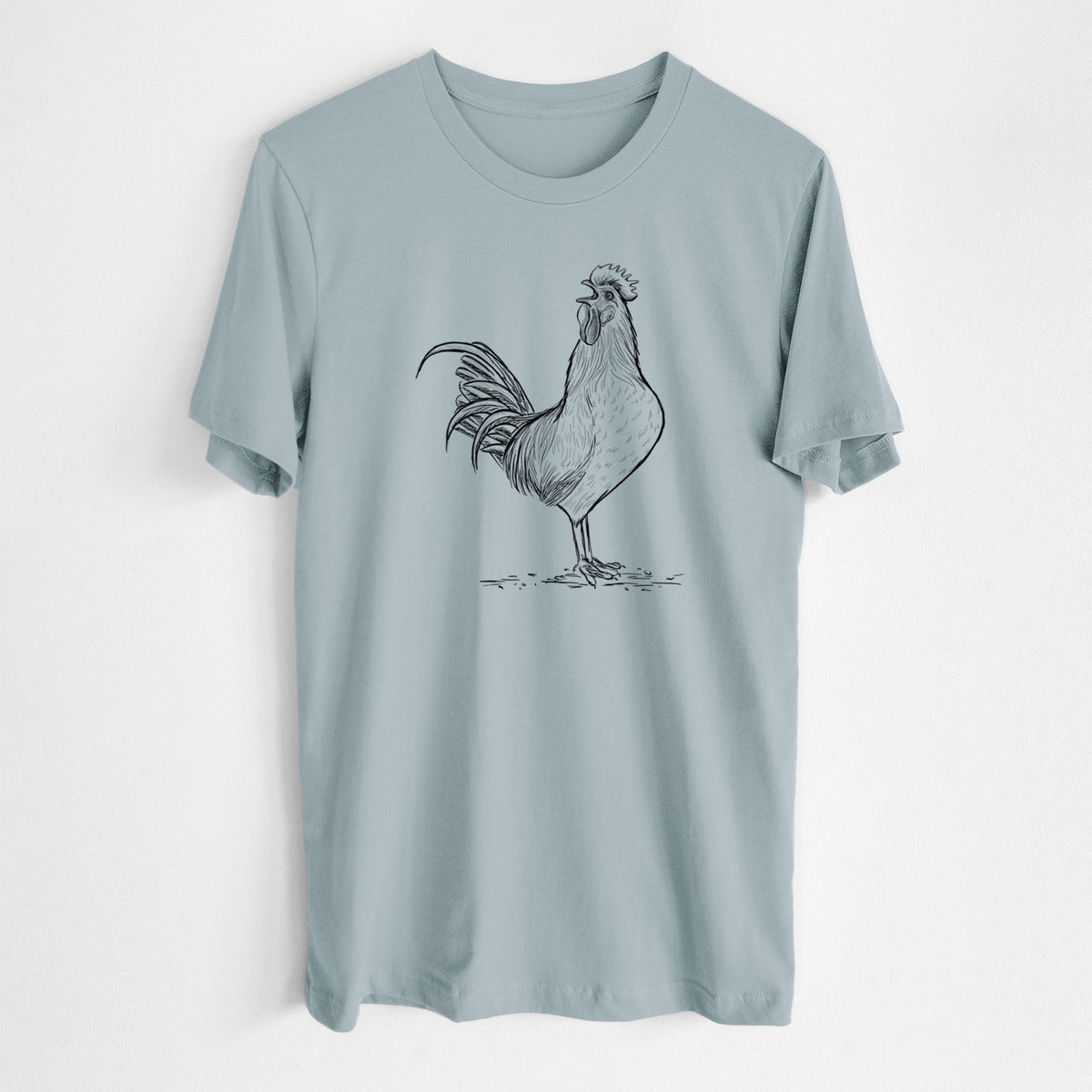Vintage denim lightweight cotton t-shirt laid flat, printed with a detailed black ink illustration of a rooster crowing.