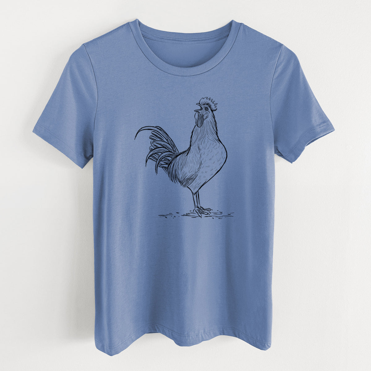 Blue bell women's relaxed fit cotton t-shirt laid flat, printed with a detailed black ink illustration of a rooster crowing.