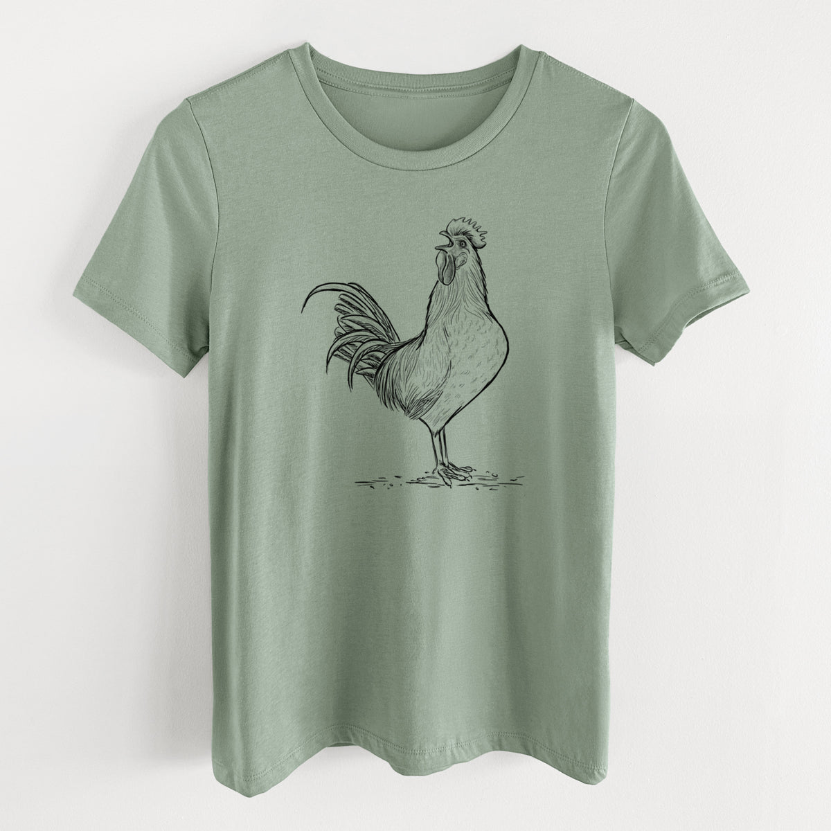 Sage green women's relaxed fit cotton t-shirt laid flat, printed with a detailed black ink illustration of a rooster crowing.