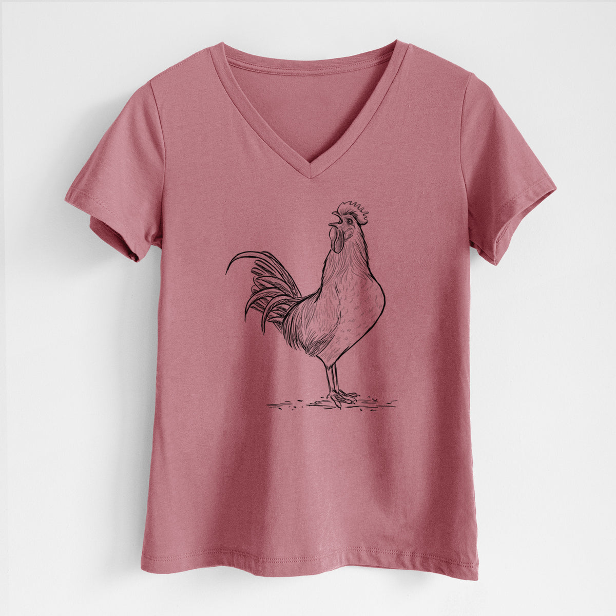 Mauve pink women's relaxed fit cotton V-neck t-shirt laid flat, printed with a detailed black ink illustration of a rooster crowing.