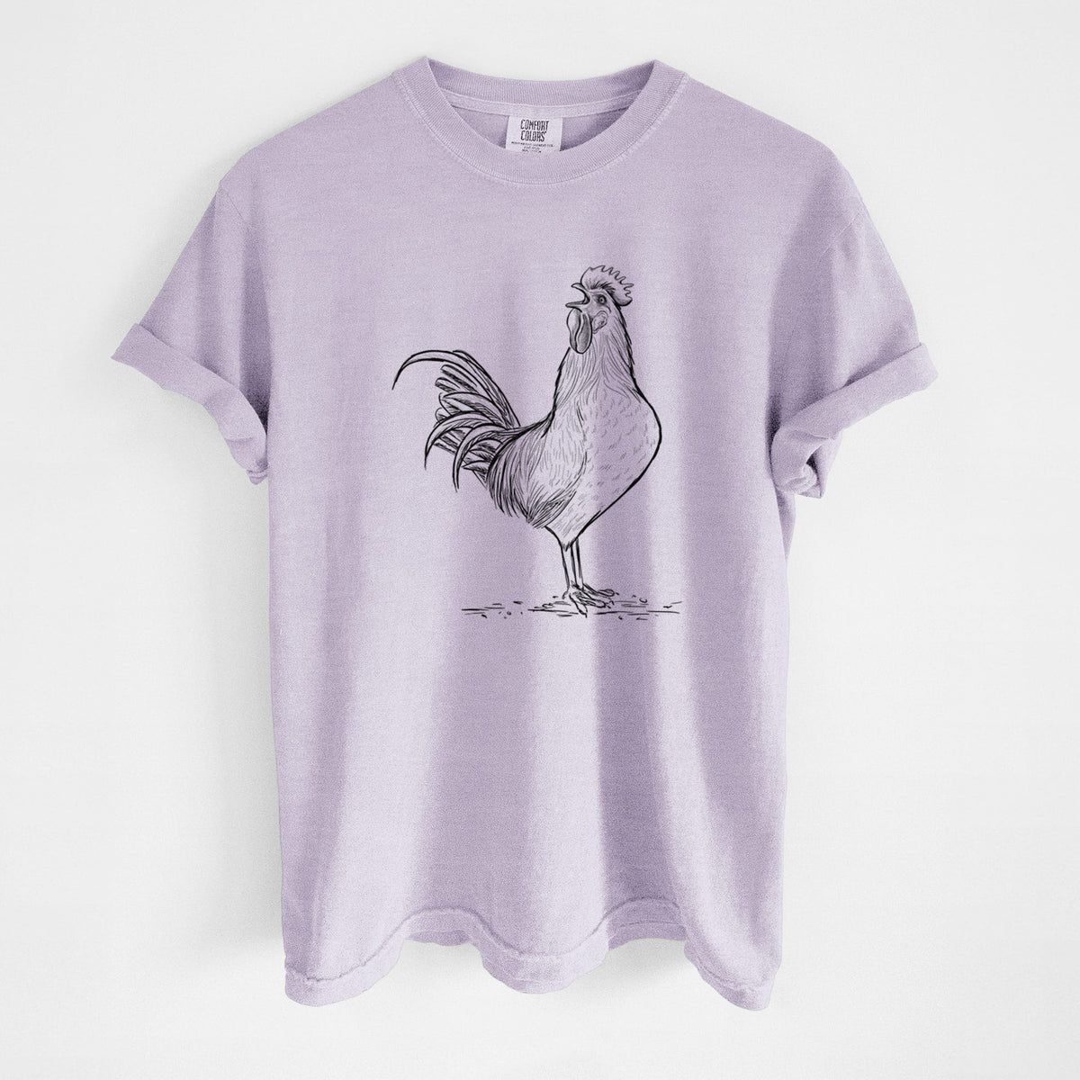 Orchid purple Comfort Colors t-shirt laid flat, printed with a detailed black ink illustration of a rooster crowing.