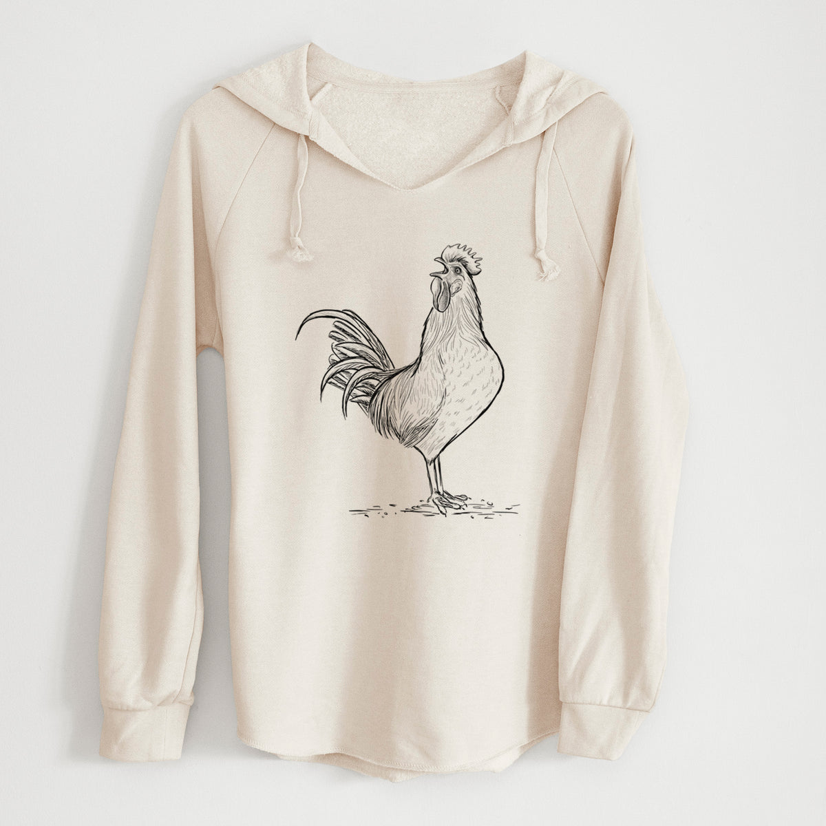 Bone cream women's Cali Wave hooded sweatshirt laid flat, printed with a detailed black ink illustration of a rooster crowing.