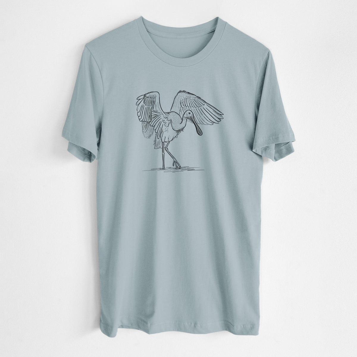 Vintage denim lightweight cotton t-shirt laid flat, printed with a black ink illustration of a roseate spoonbill standing with its wings spread.