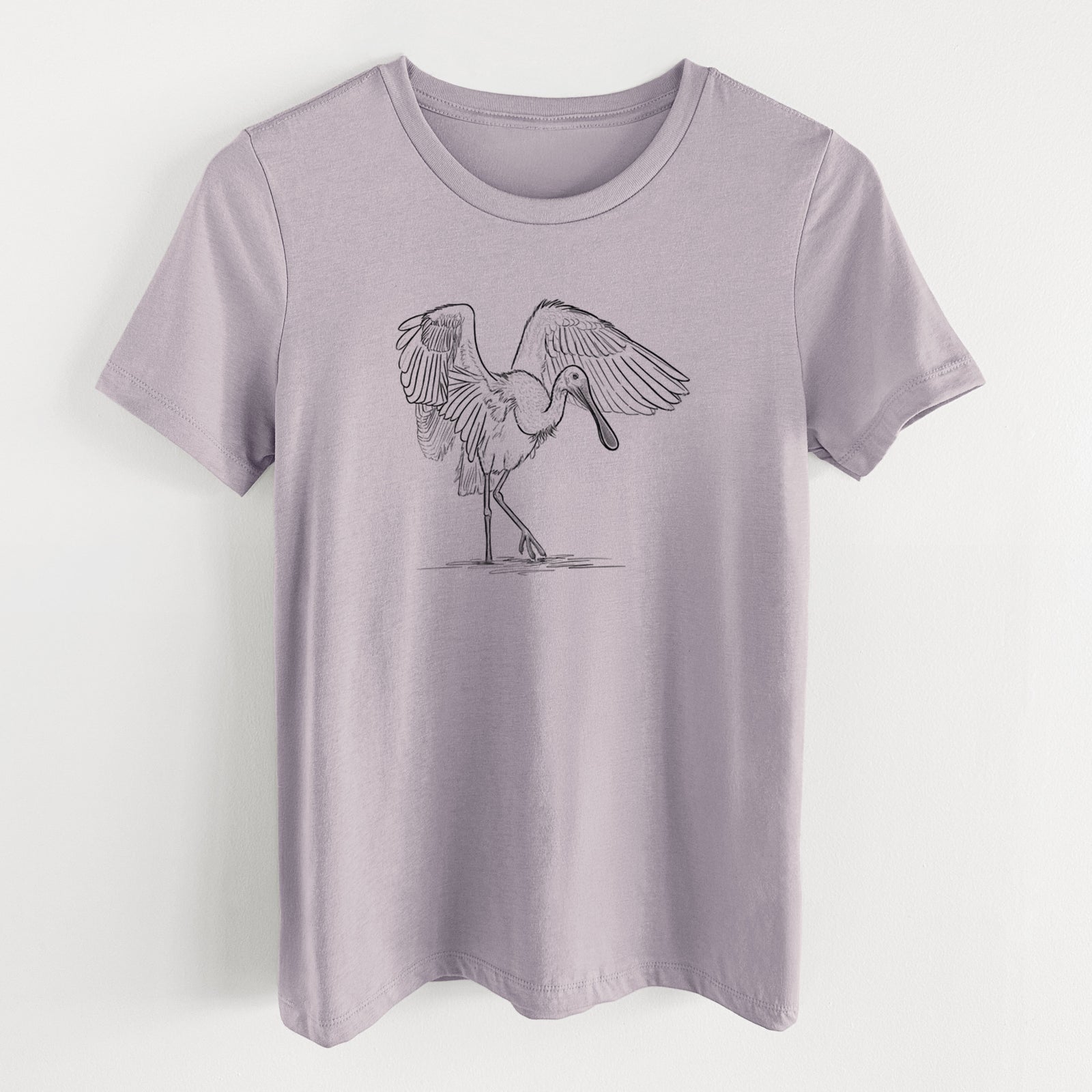 Light violet women's relaxed fit cotton t-shirt laid flat, printed with a black ink illustration of a roseate spoonbill standing with its wings spread.