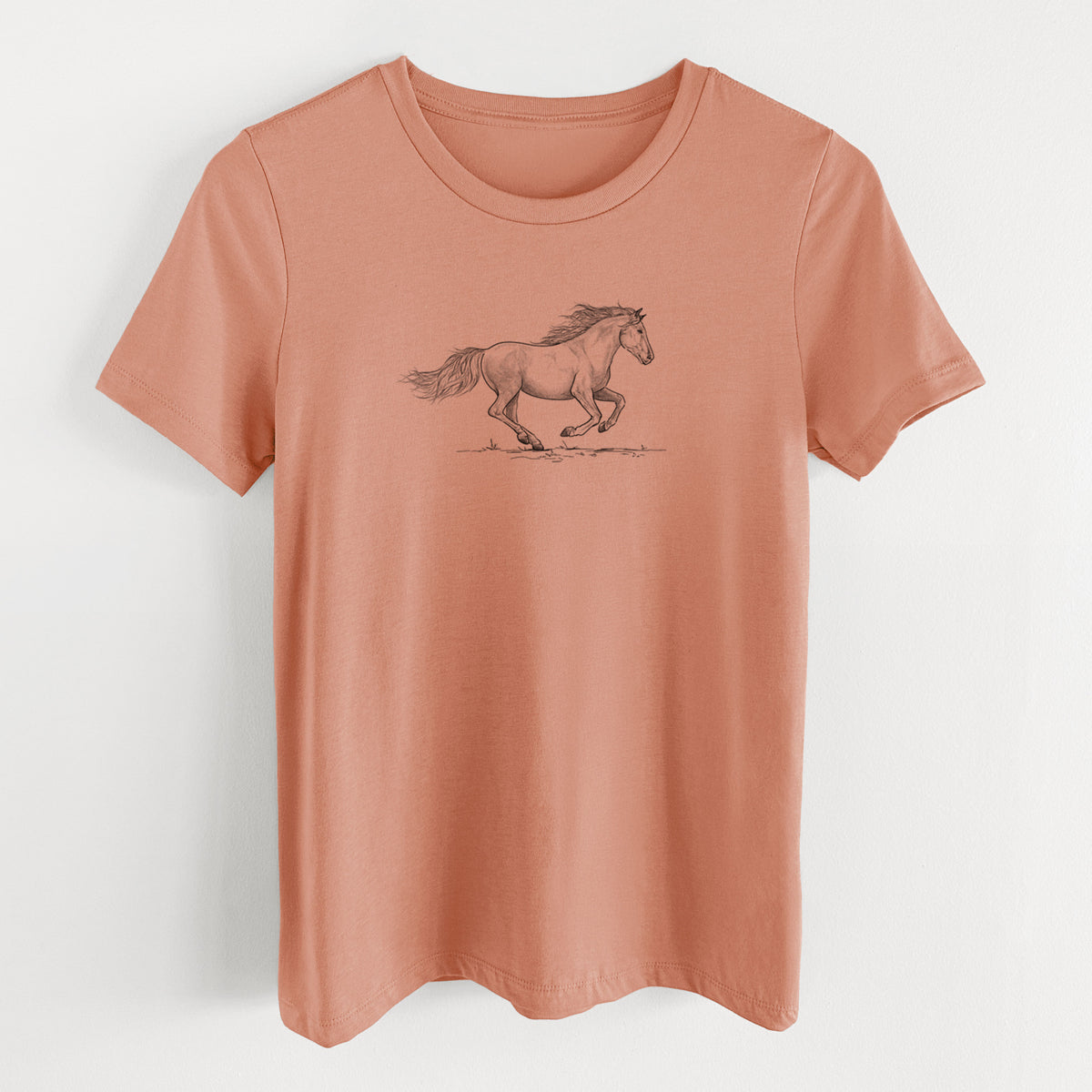 Terracotta orange women's relaxed fit cotton t-shirt laid flat, printed with a black ink illustration of a mustang horse running.